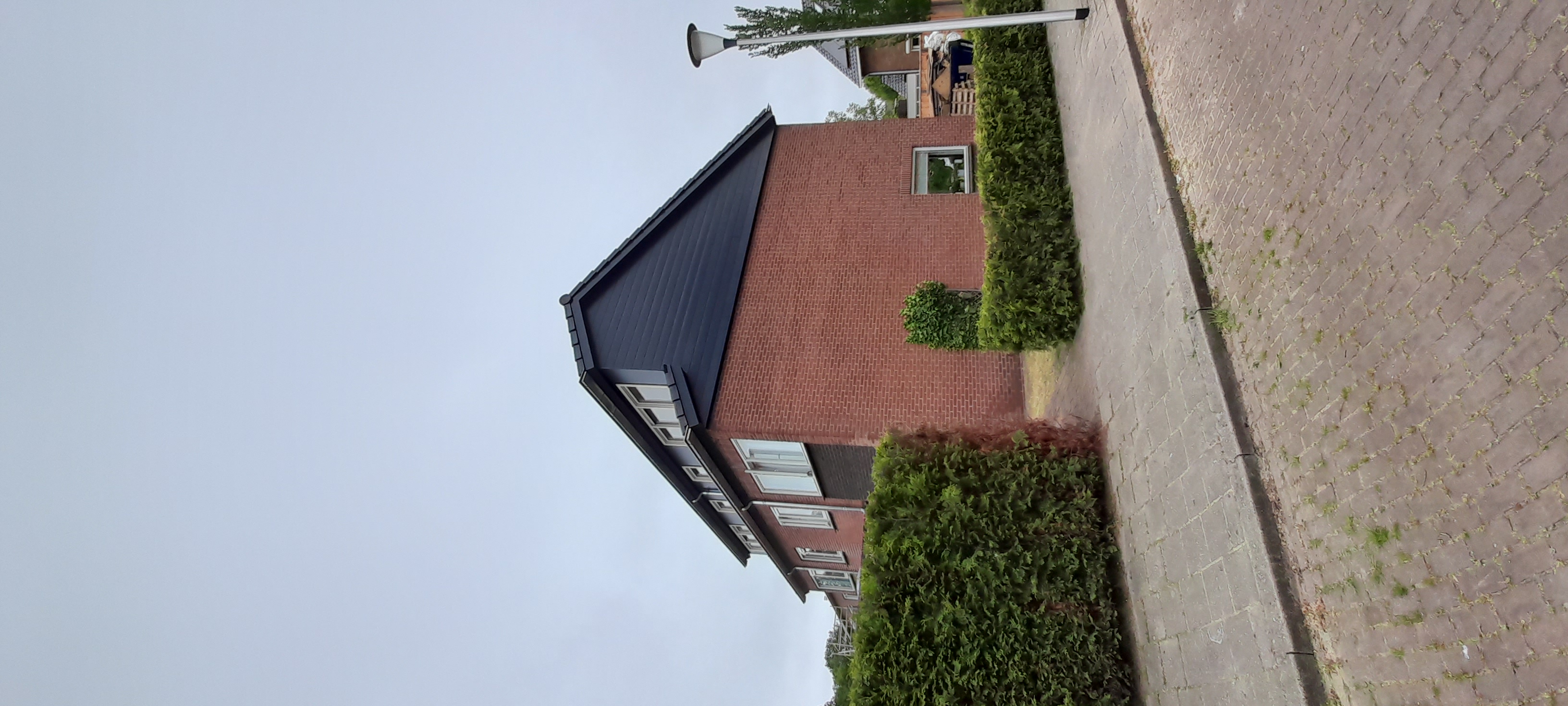 Restauratie en verduurzaming hellend dak en dakkapellen Rossum foto